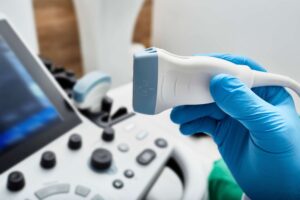 Ultrasound machine with hand